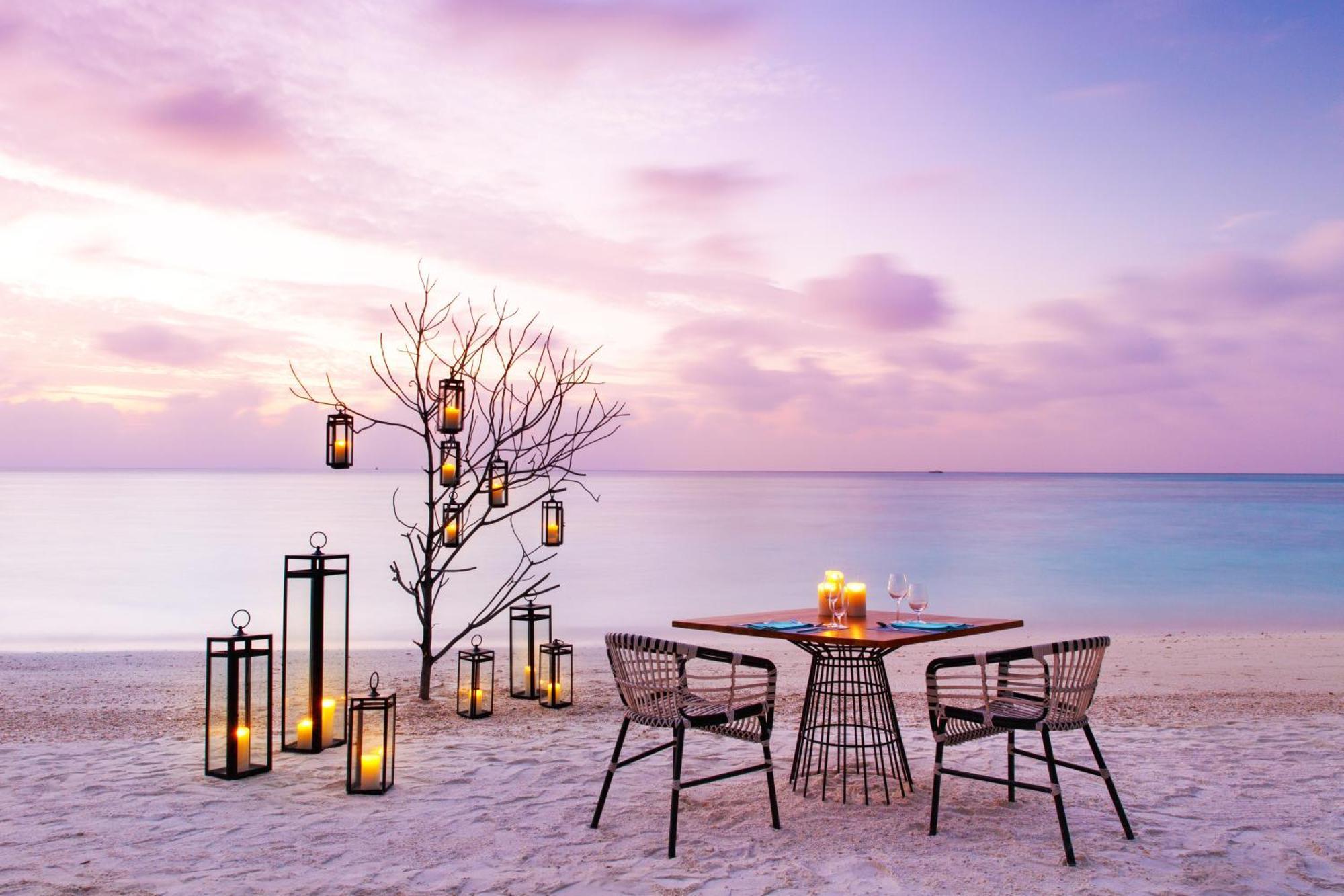 Kandima Maldives Kudahuvadhoo Exterior photo Sunset at the beach